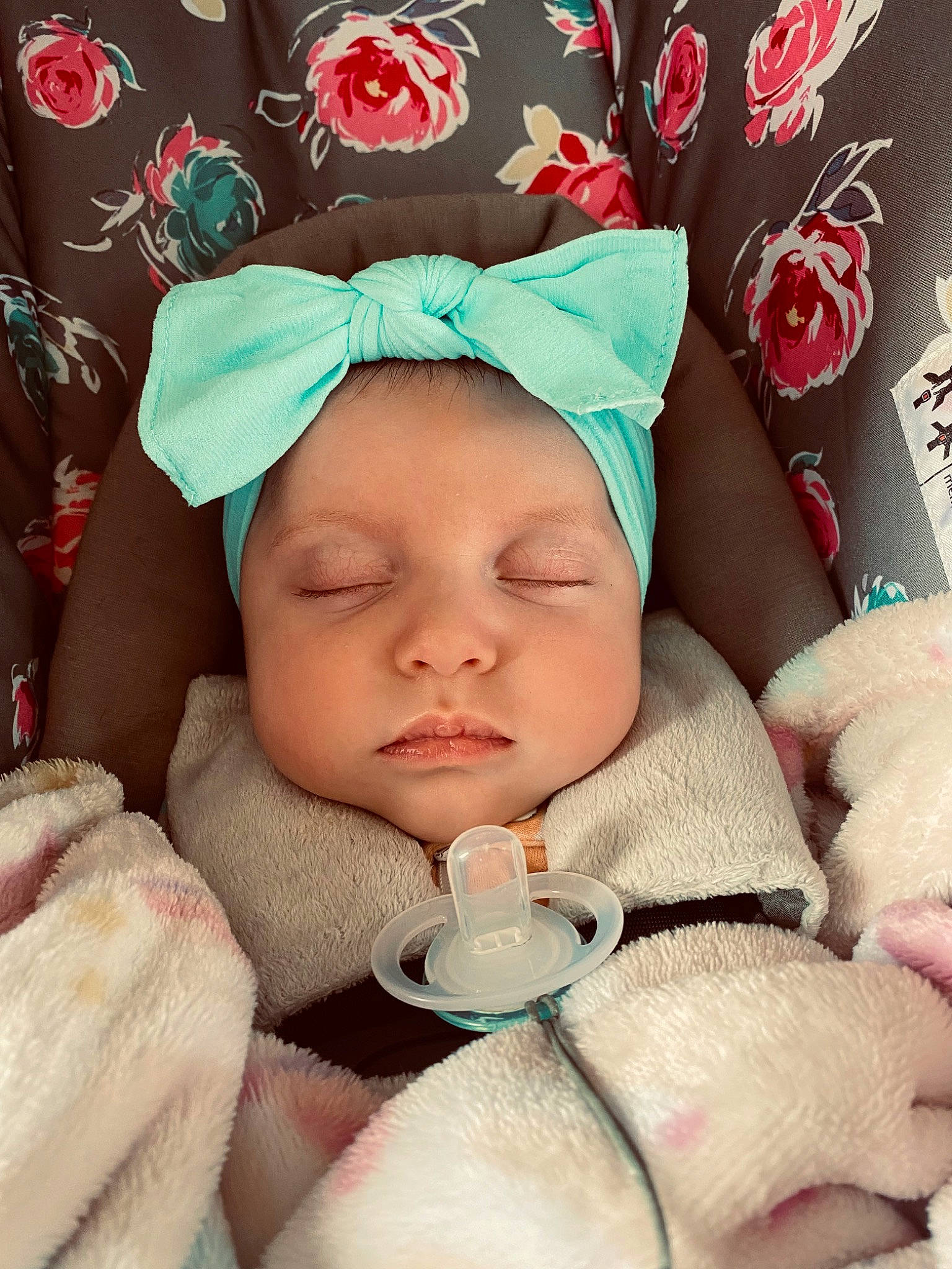 Oaklynn Mae is registered to the contest to win money with this photo: baby, baby_sleeping, baby_toddler_clothing, cap, cheek, child, comfort, face, facial_expression, finger, happy, headgear, headwear, human, linens, mouth, person, pink, product, skin