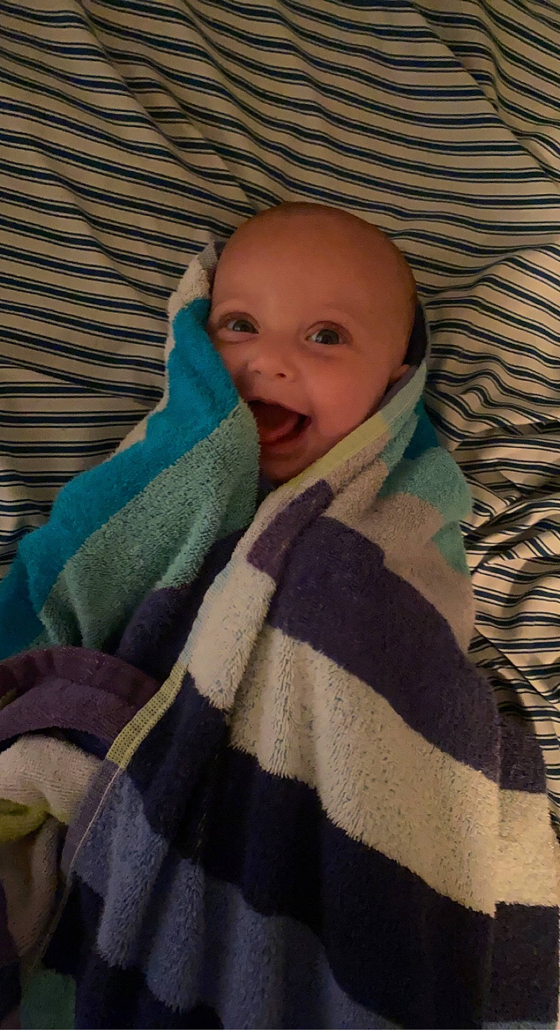 Oaklynn Mae joined the competition — help win amazing prizes! baby, blanket, child, comfort, fun, fur, headwear, linens, outerwear, pattern, person, room, shawl, skin, sleeve, smile, textile, toddler, wood, wool