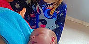 Maëlia participe au concours pour gagner de l'argent avec cette photo : child, baby, smiling, sleeping, unicorn, blue_blanket, heart_doodle, indoor, cozy, family, cute, happy, portrait, young_child, infant, clothing, holding, peaceful, tender, love