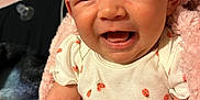 Autumn joined the competition — help win amazing prizes! baby, infant, smiling, happy, blanket, pink, mittens, clothing, ladybug_print, cute, indoor, closeup, person, skin, face, head, newborn, soft, warm, cozy