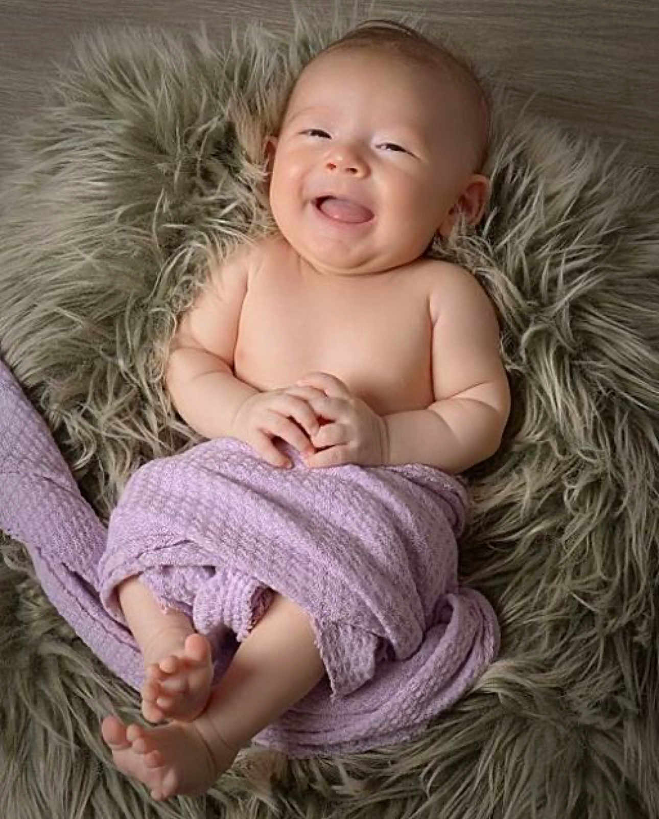 Autumn joined the competition — help win amazing prizes! baby, smiling, blanket, purple, fluffy, rug, barefoot, happy, infant, cute, hand, feet, skin, lying_down, portrait, child, cozy, soft_texture, relaxed, indoors