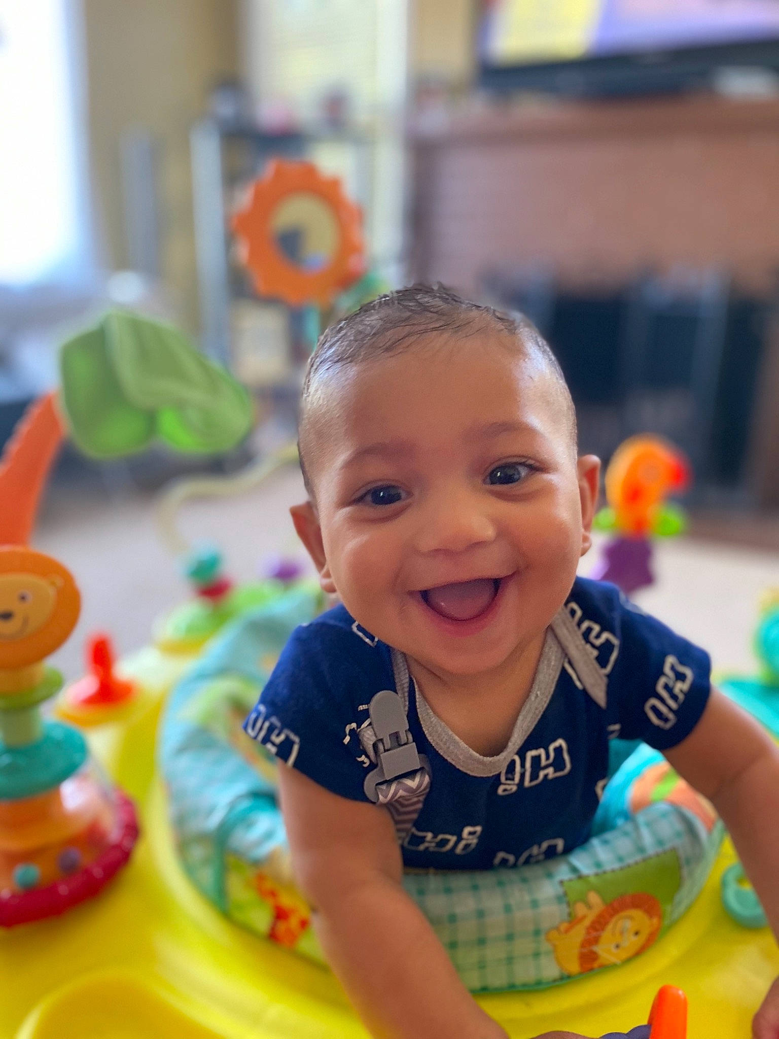 Boston is registered to the contest to win money with this photo: baby, baby_playing_with_toys, baby_toys, cheek, child, face, fun, joy, kindergarten, person, play, product, sitting, skin, smile, toddler, toy, tummy_time