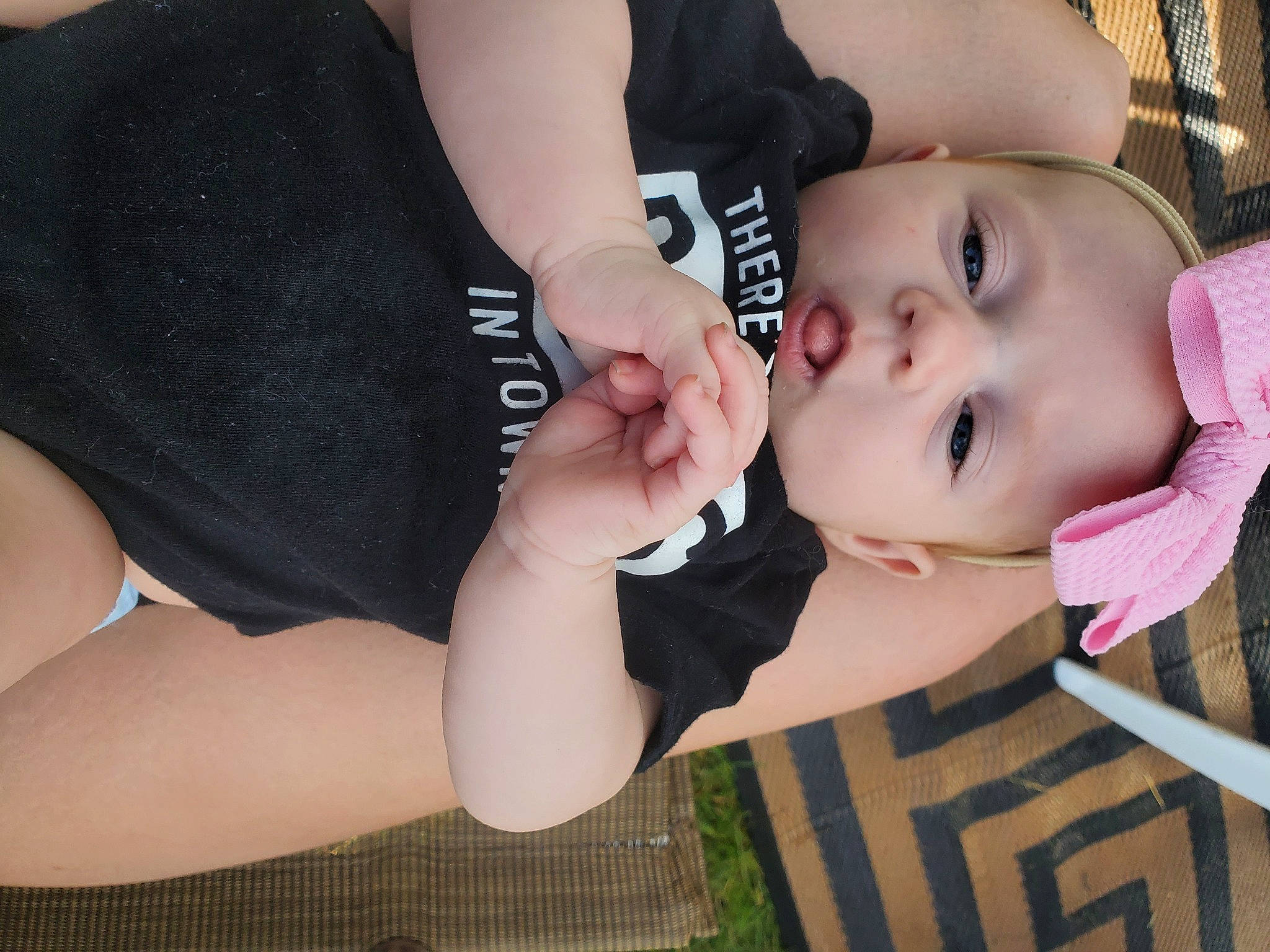 Lilliana joined the competition — help win amazing prizes! arm, baby, baby_toddler_clothing, black_hair, cheek, comfort, elbow, eyelash, gesture, grass, happy, joint, lip, nail, nose, person, skin, sleeve, thigh, toddler