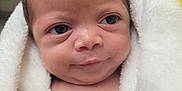 Elijah joined the competition — help win amazing prizes! baby, blanket, child, closeup, cute, expression, eyes, face, head, indoors, infant, newborn, newborn_baby, person, portrait, skin, smile, soft, wrapped, young