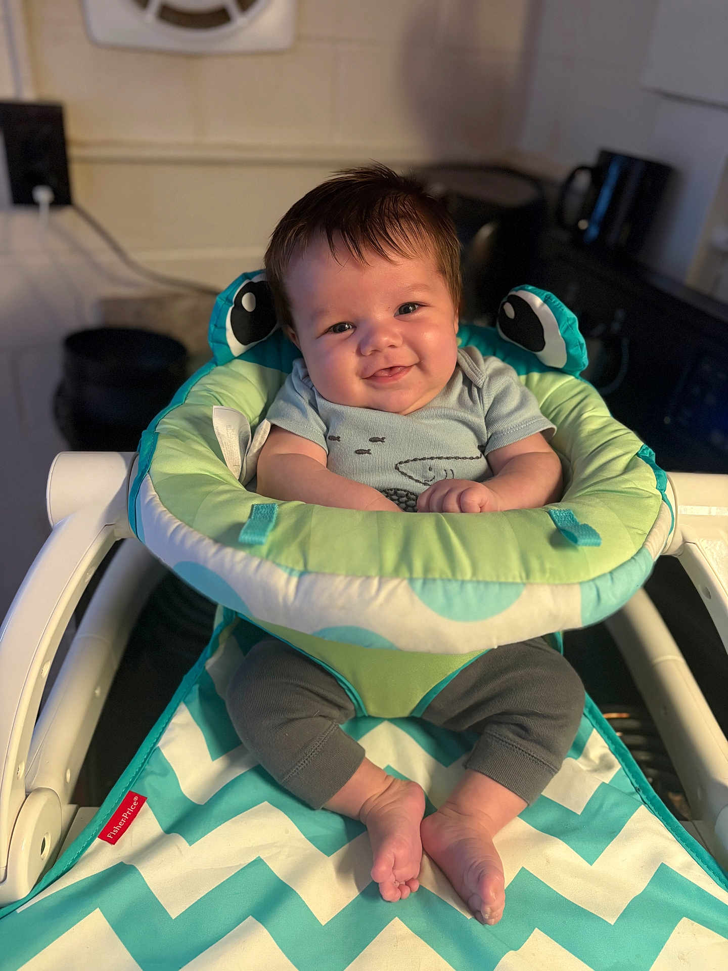 Wesson Ryan joined the competition — help win amazing prizes! baby, infant, smiling, cute, fisher_price, baby_seat, child, indoors, happy, face, legs, feet, clothing, cushion, toy, soft, comfort, portrait, closeup, person