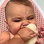 Riley-Rae is registered to the contest to win money with this photo: baby, infant, chewing, face, hand, skin, sponge, pink_background, closeup, expression, cute, chubby, indoors, child, person, head, photography, texture, soft, bath