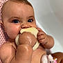Riley-Rae is registered to the contest to win money with this photo: baby, child, bath, sponge, unicorn_toy, water, skin, hand, face, blue_eyes, cute, wet, infant, playful, closeup, chubby, bath_time, toy, chewing, happy