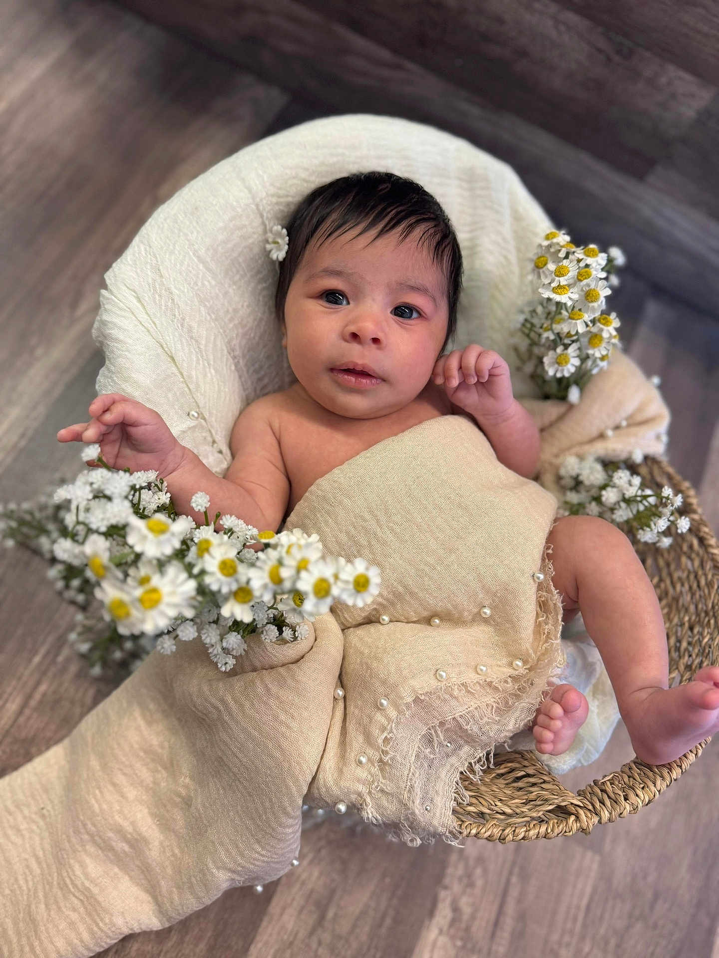 Elodie joined the competition — help win amazing prizes! baby, infant, blanket, flowers, basket, portrait, cute, wrapped, soft_texture, indoor, wooden_floor, decorative, pearls, newborn, child, peaceful, smiling, hand, foot, face