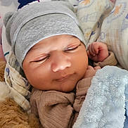 Azyan is registered to the contest to win money with this photo: baby, sleeping, hat, blanket, cozy, infant, cute, soft, wrapped, child, newborn, face, clothing, resting, indoors, closeup, warm, peaceful, adorable, portrait