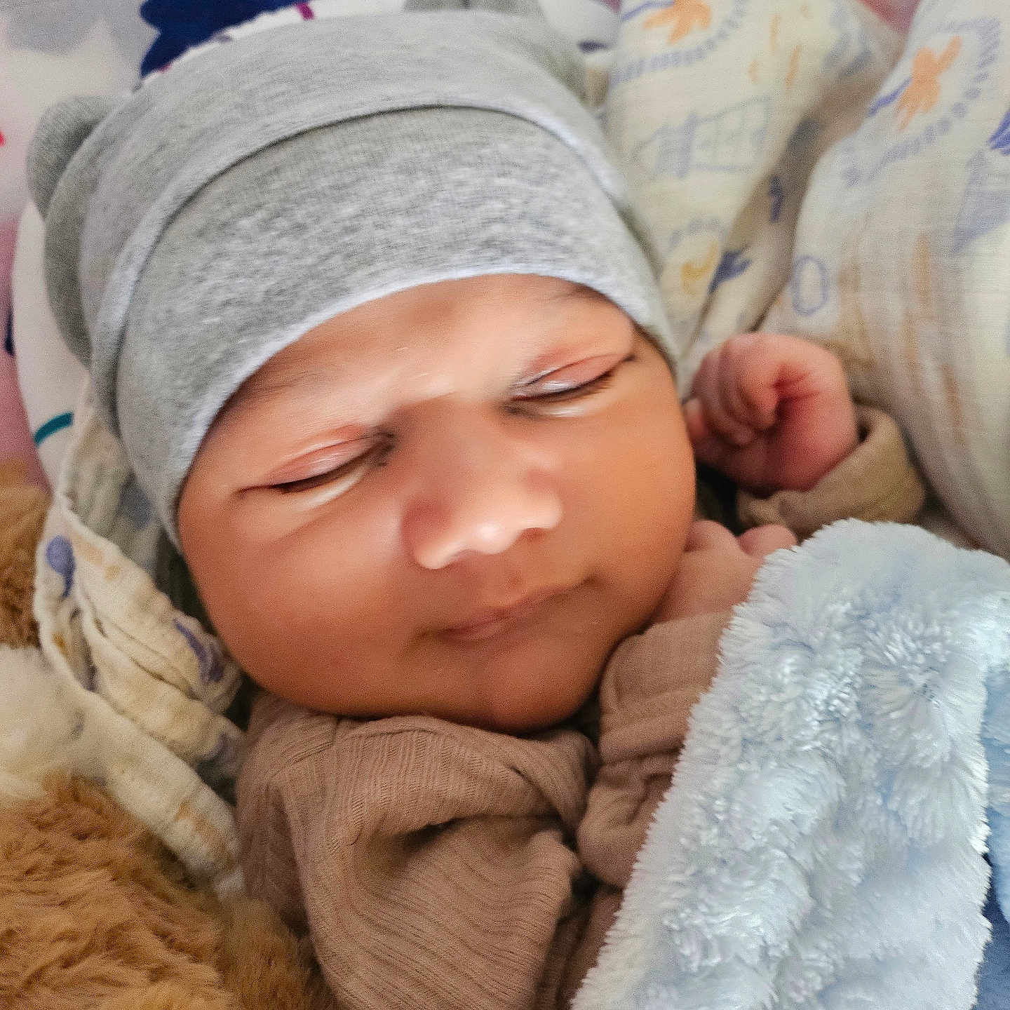 Azyan is registered to the contest to win money with this photo: baby, sleeping, hat, blanket, cozy, infant, cute, soft, wrapped, child, newborn, face, clothing, resting, indoors, closeup, warm, peaceful, adorable, portrait