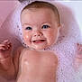 baby, blue_eyes, bath, bubbles, foam, water, smile, happy, skin, infant, child, cute, portrait, close_up, relaxation, cleaning, young, playful, pink, wet