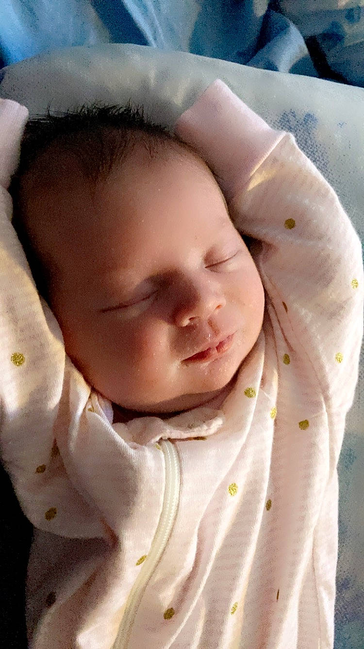 Alexandria is registered to the contest to win money with this photo: baby, baby_toddler_clothing, cheek, child, chin, collar, comfort, eyebrow, face, happy, head, linens, lip, nose, person, portrait_photography, skin, sleeve, smile, textile