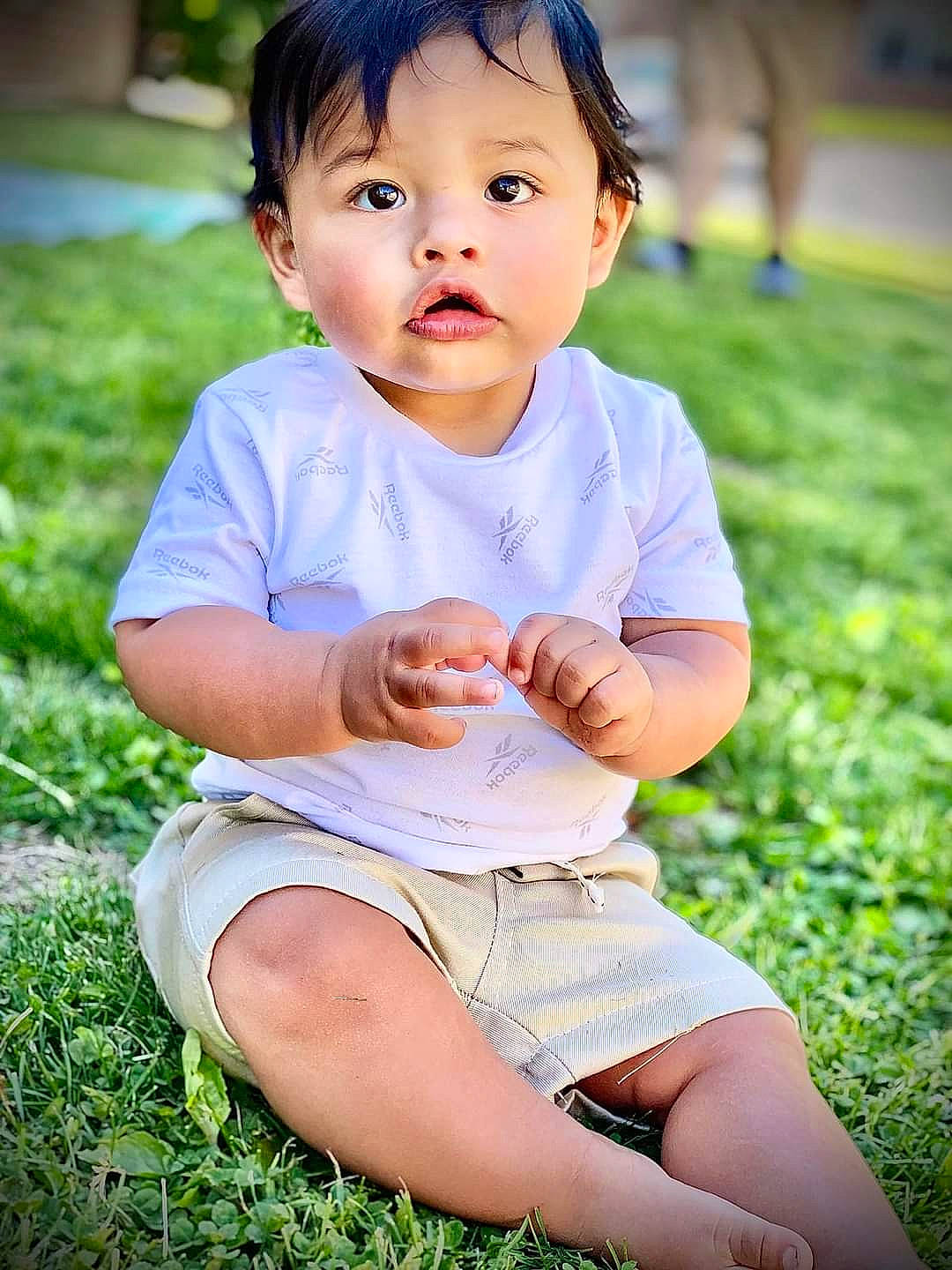 Braylon joined the competition — help win amazing prizes! cheek, child, eye, face, facial_expression, flash_photography, grass, green, hair, happy, head, human_body, leisure, people_in_nature, person, photograph, plant, shorts, skin, sunlight