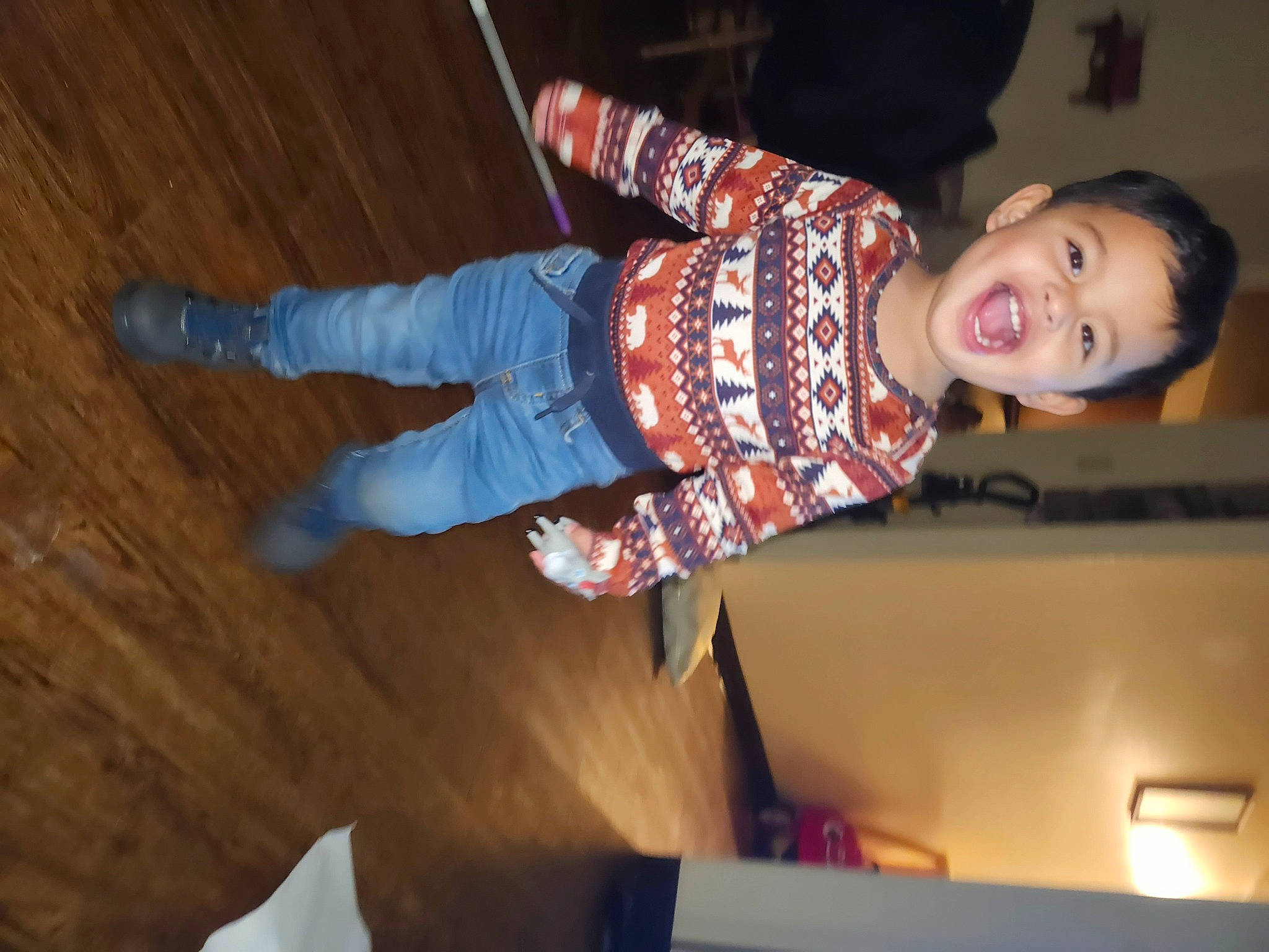 Braylon is registered to the contest to win money with this photo: baby_toddler_clothing, child, event, flash_photography, flooring, fun, happy, hardwood, leisure, person, smile, toddler, varnish, wood, wood_flooring, wood_stain