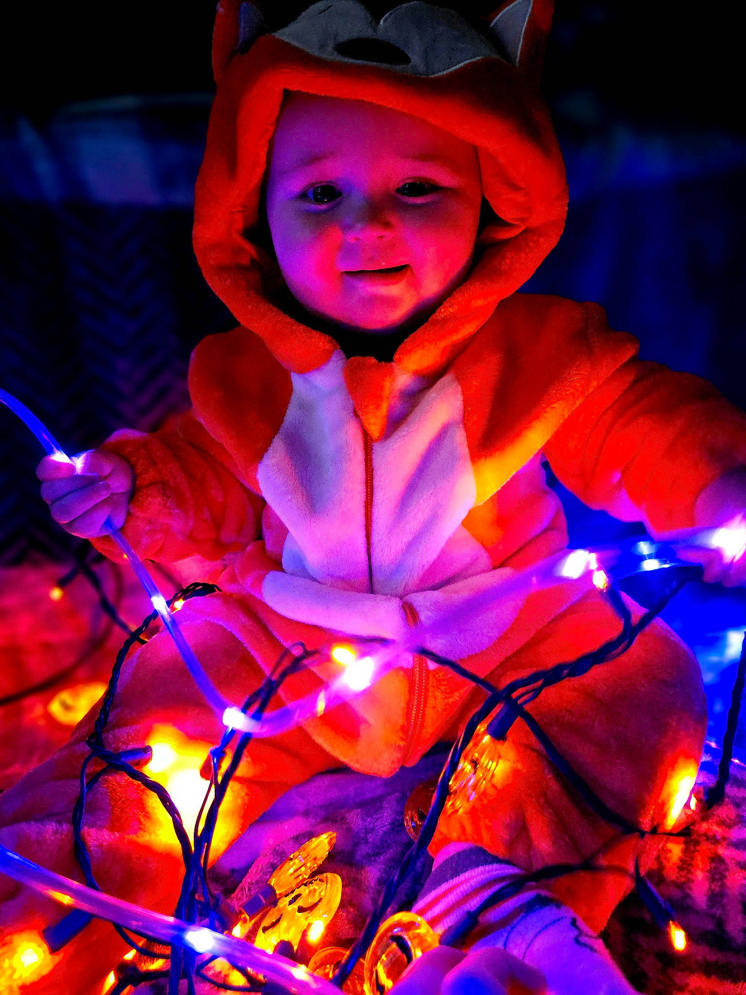 Austin joined the competition — help win amazing prizes! art, beauty, electric_blue, entertainment, event, fun, happy, headgear, headwear, human, light, magenta, neon, night, person, pink, plant, purple, red, smile