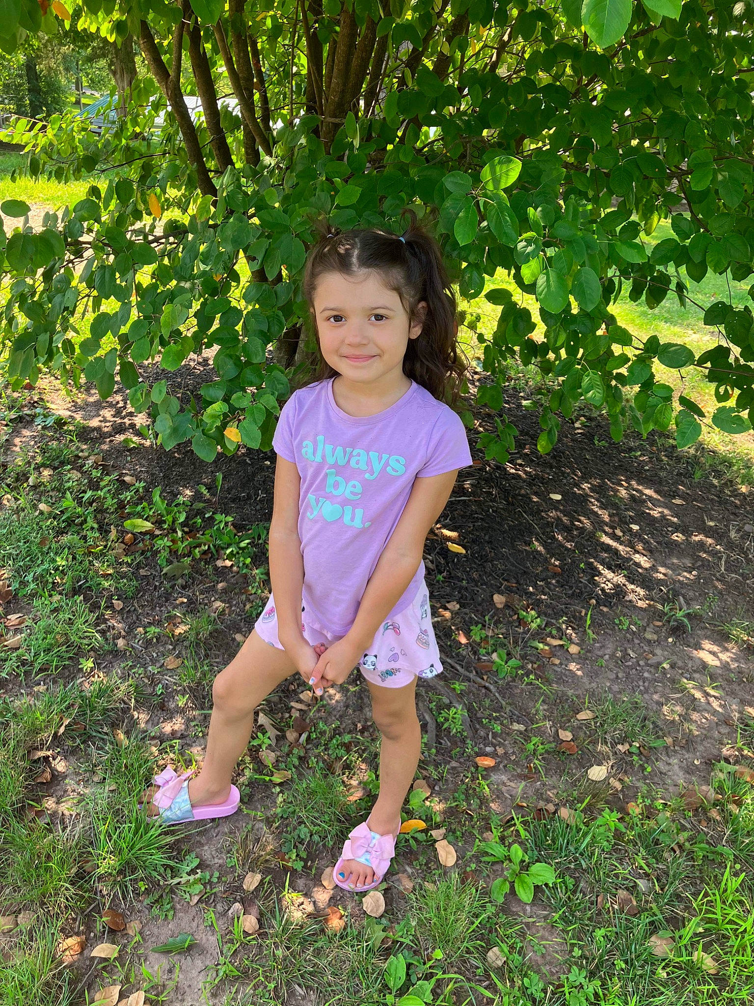 Katalaya is registered to the contest to win money with this photo: baby_toddler_clothing, child, fun, garden, grass, groundcover, happy, joy, leisure, magenta, people_in_nature, person, plant, sandal, shrub, smile, spring, terrestrial_plant, toddler, tree