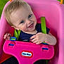 Sylvia is registered to the contest to win money with this photo: baby, child, swing, pink_swing, outdoor, green_background, happy, smiling, blue_eyes, short_hair, clothing, toy, playground, seatbelt, play, fun, person, infant, summer, daylight