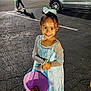 Promise joined the competition — help win amazing prizes! child, girl, smile, costume, dress, bucket, parking_lot, car, night, asphalt, sparkle, bow, happy, person, holding, outdoor, portrait, fashion, cute, celebration