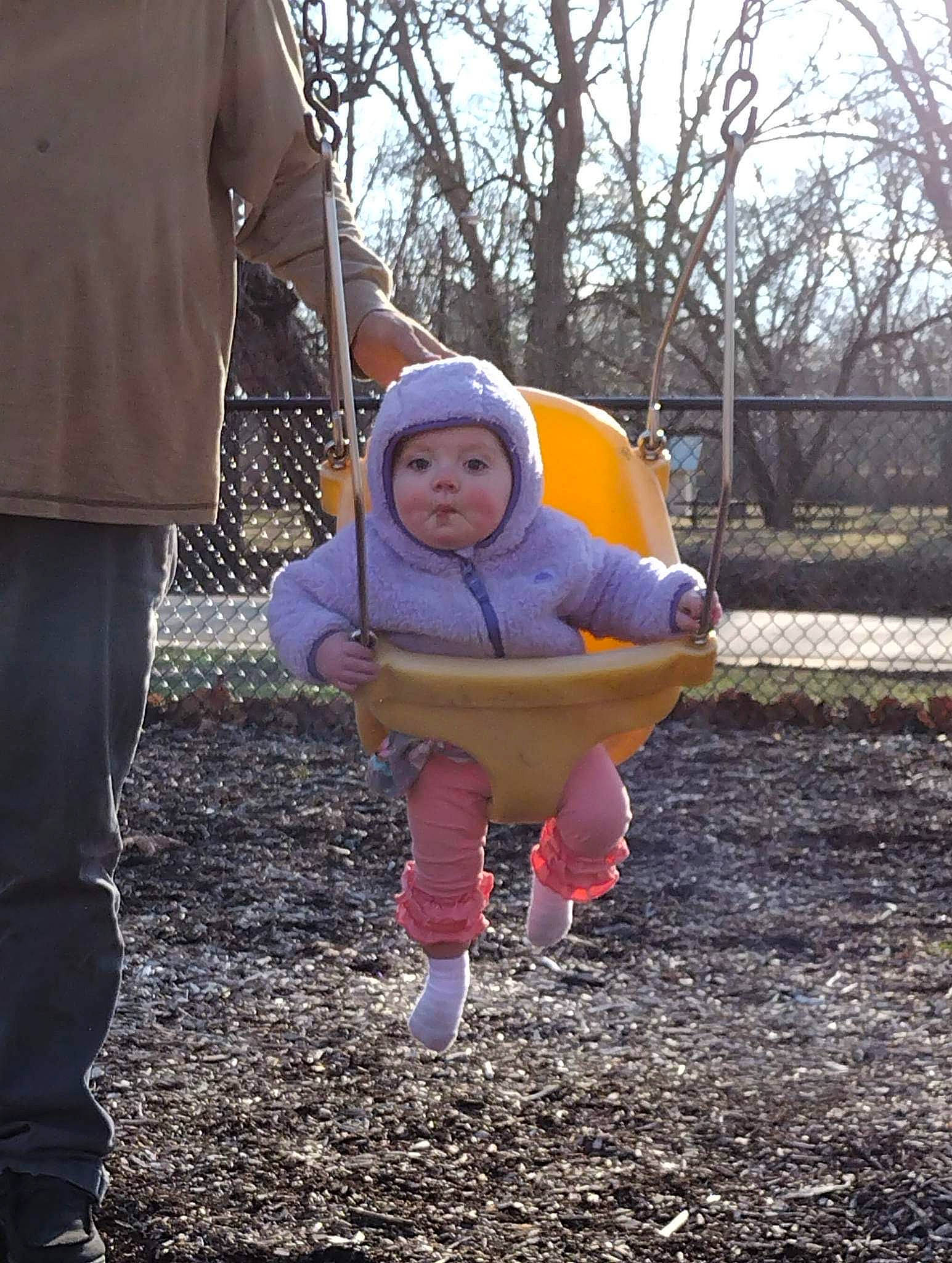 Rylee joined the competition — help win amazing prizes! baby, child, eye, face, fun, grass, happy, headwear, jacket, leaf, leisure, outdoor_play_equipment, people_in_nature, person, plant, play, recreation, sky, soil, toddler