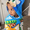 animal_ears, carpet, child, clothing, colorful, cozy, curious, door, face, home, hood, indoor, looking_away, person, portrait, soft_texture, sonic_the_hedgehog, stairs, towel, young