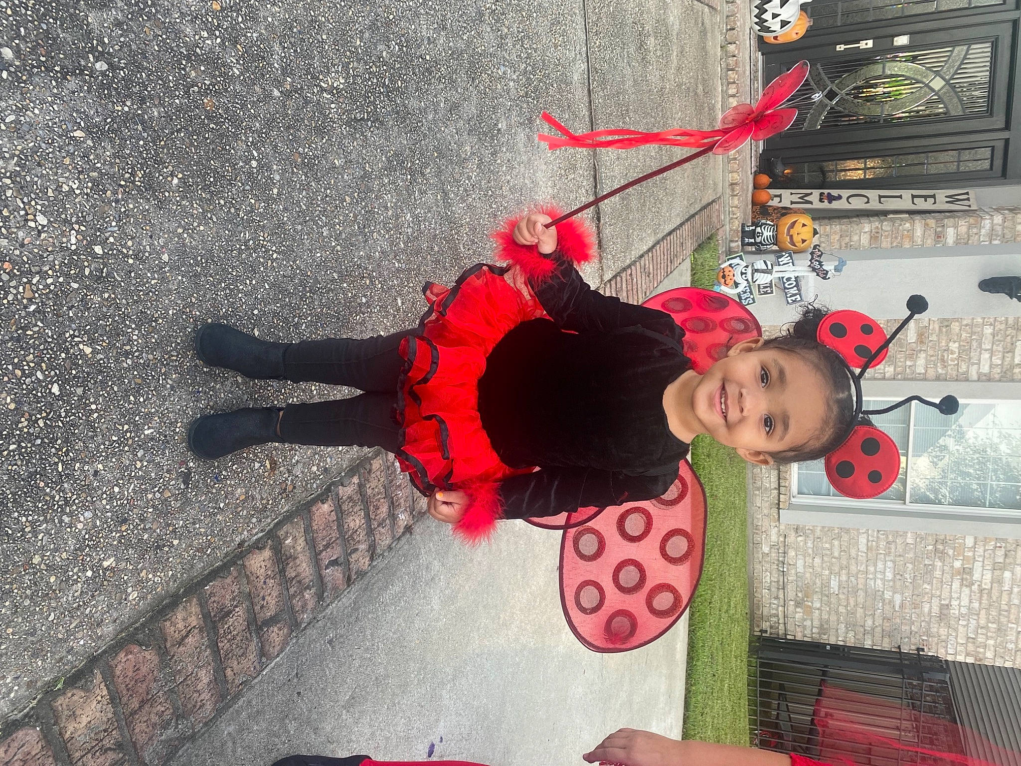 Aubreigh joined the competition — help win amazing prizes! art, asphalt, carmine, concrete, costume, flooring, fun, joy, leisure, person, road_surface, sidewalk, street, toddler, tree, winter