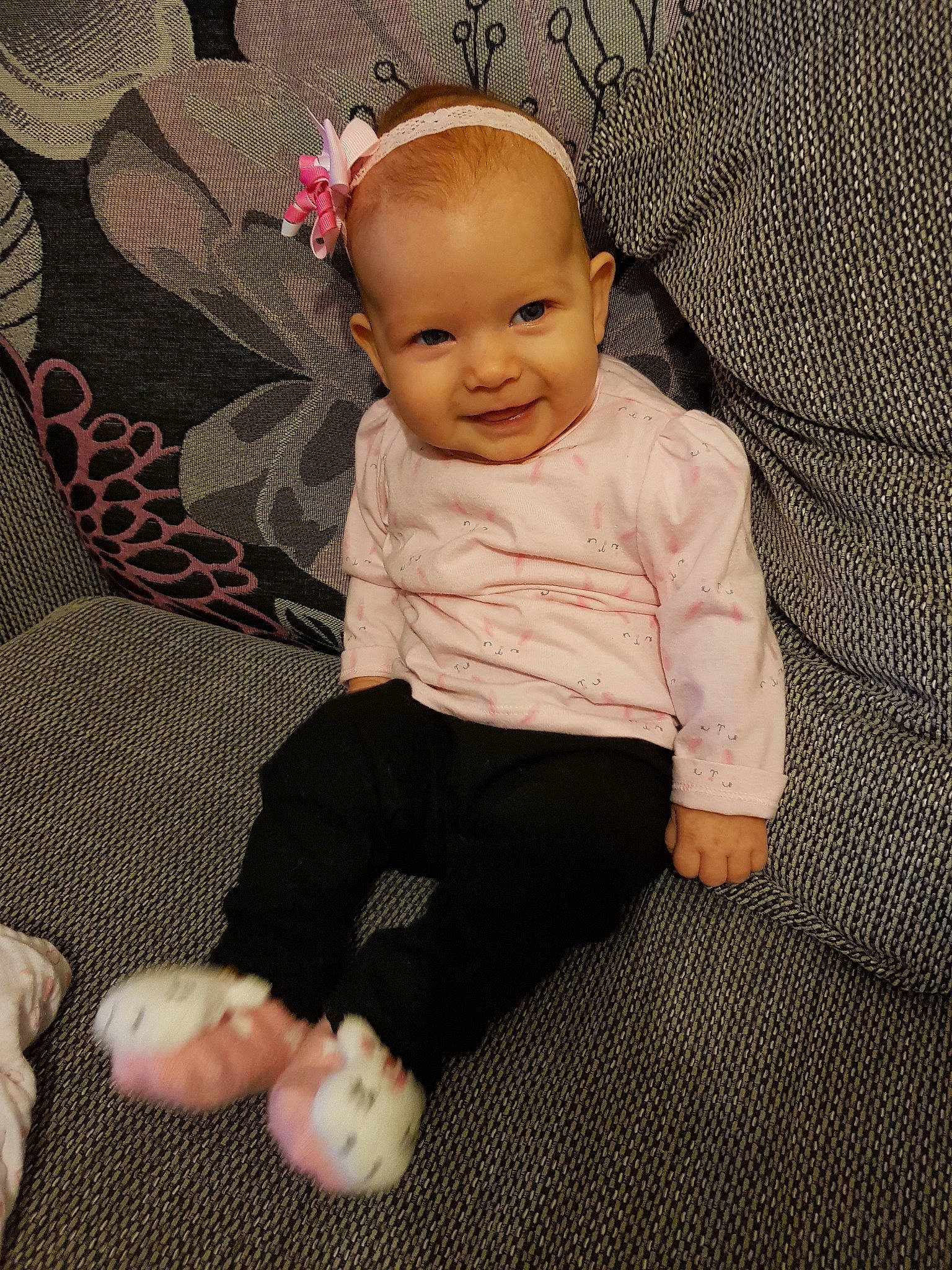 Tillie-mae is registered to the contest to win money with this photo: child, day, eye, girl, infant, iris, joy, person, pink, product, sitting, skin, smile, textile, toddler