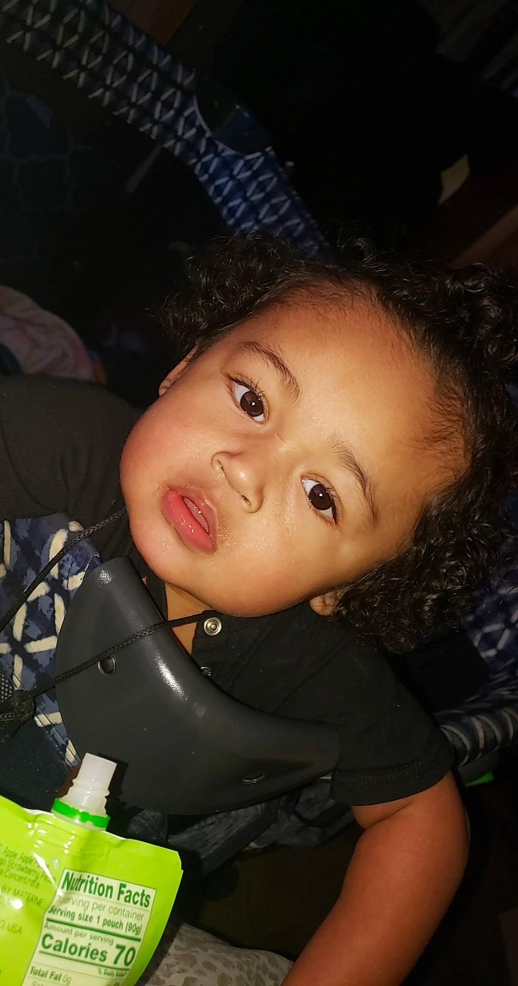 Shakur is registered to the contest to win money with this photo: black_hair, cap, cheek, cool, eye, eyebrow, eyelash, flash_photography, fun, happy, hat, headgear, iris, lip, mouth, nose, person, skin, smile, toddler