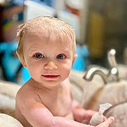 Jack is registered to the contest to win money with this photo: baby, blonde, bodypart, face, finger, frown, hair, hand, happy, head, mouth, newborn, person, photography, portrait, sad, sink, smile
