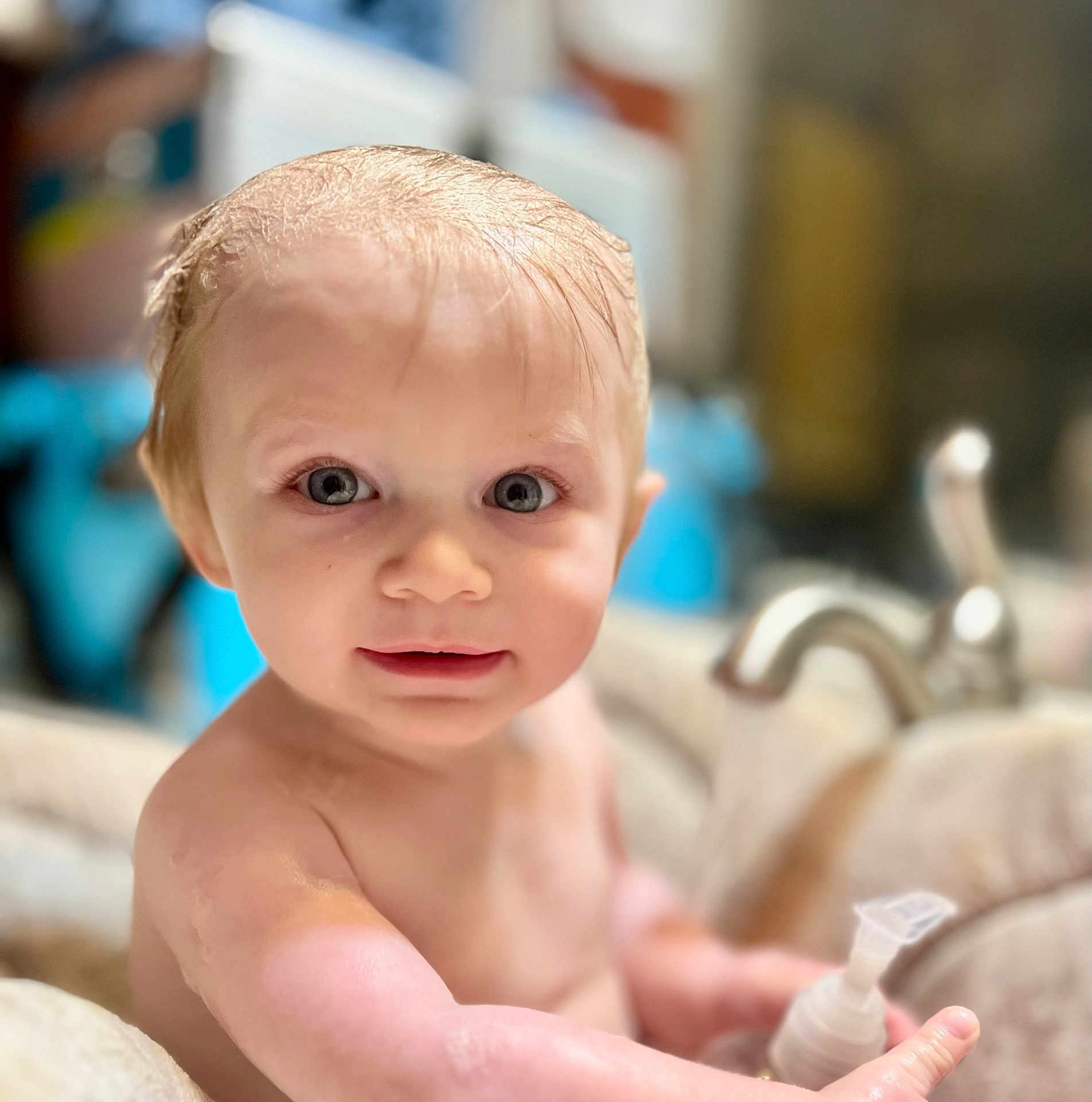 Jack is registered to the contest to win money with this photo: baby, blonde, bodypart, face, finger, frown, hair, hand, happy, head, mouth, newborn, person, photography, portrait, sad, sink, smile