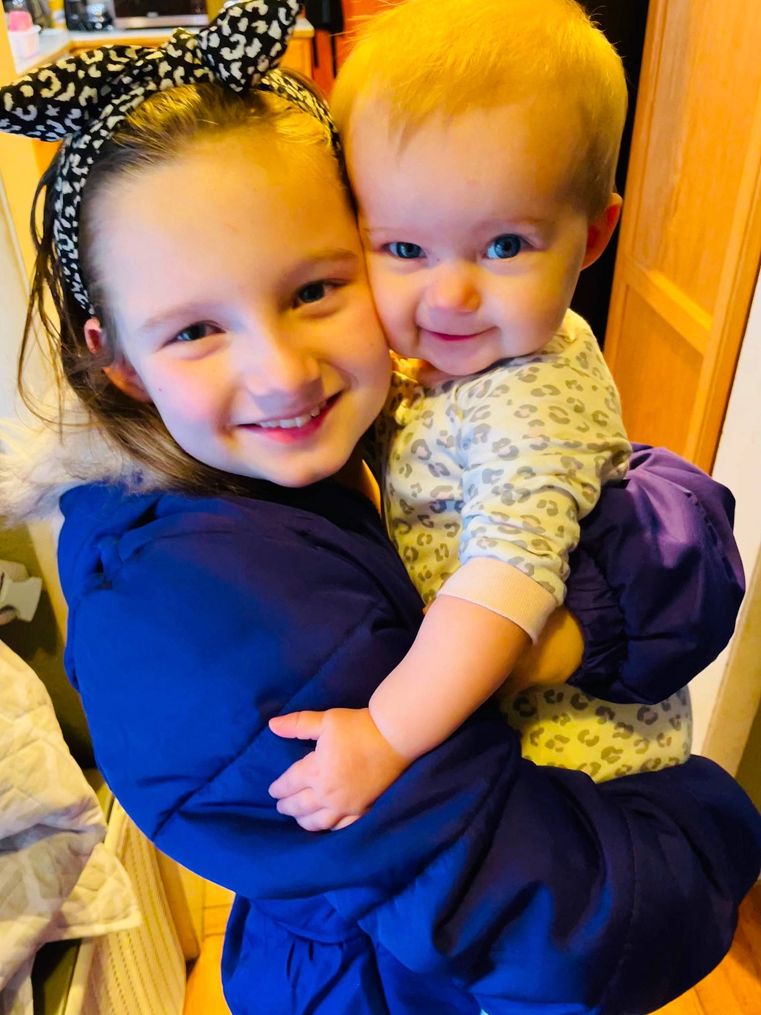 Paizley is registered to the contest to win money with this photo: baby_toddler_clothing, beauty, blue, child, electric_blue, event, eye, facial_expression, fun, gesture, happy, headpiece, iris, jewellery, joy, organ, people, person, purple, smile