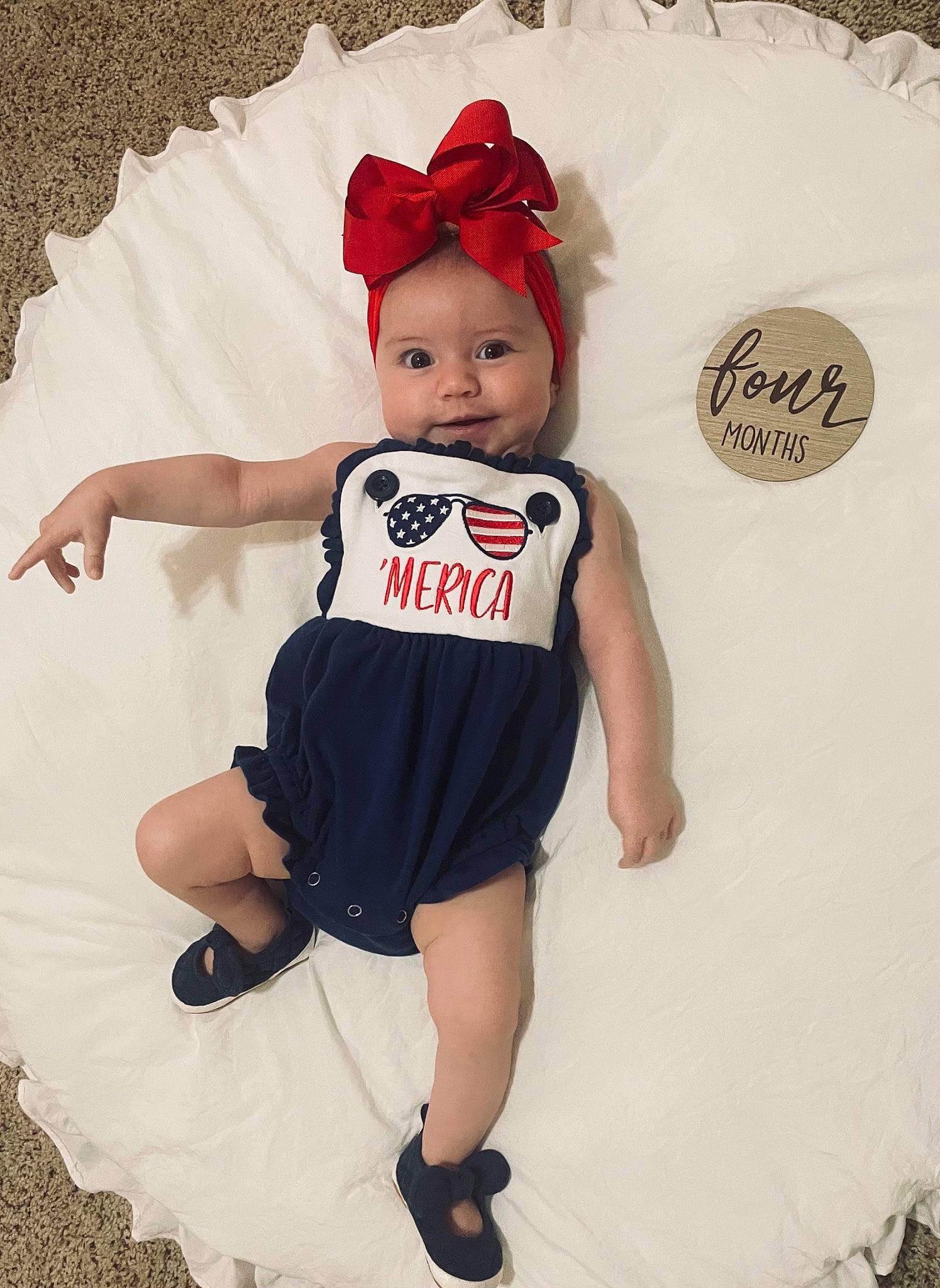 Hensley is registered to the contest to win money with this photo: arm, baby_toddler_clothing, cap, child, costume_hat, fashion_design, font, happy, headgear, headwear, pattern, person, pink, sandal, sleeve, sportswear, style, t_shirt, thigh, toddler