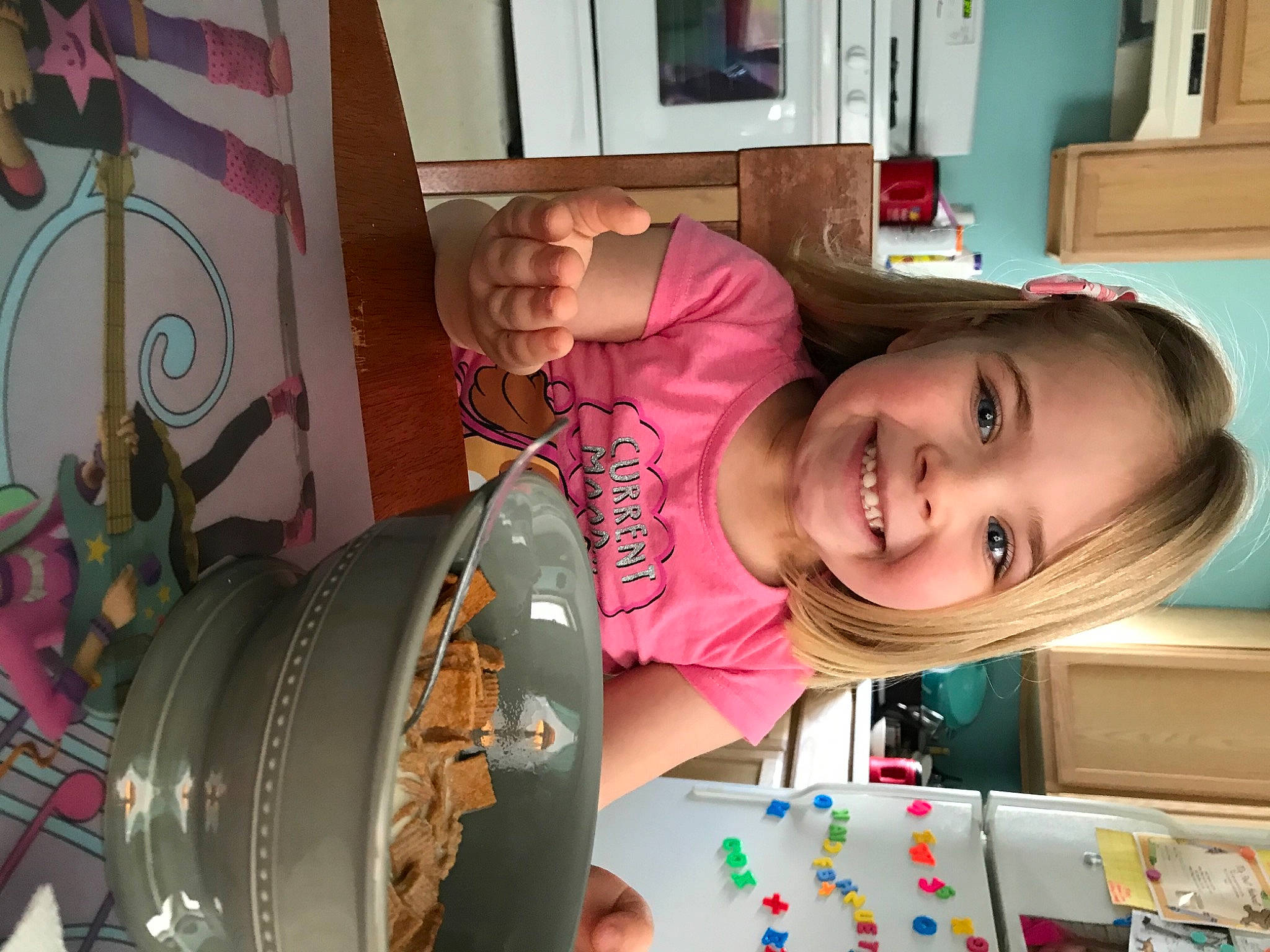 Ireland is registered to the contest to win money with this photo: automotive_wheel_system, baby, chair, child, circle, event, fun, happy, hat, joy, machine, mechanical_fan, organ, party, person, pink, room, smile, snapshot, t_shirt