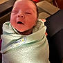 Braxton joined the competition — help win amazing prizes! newborn, baby, swaddled, blanket, sleeping, infant, cozy, soft, hand, face, indoors, person, cute, peaceful, wrapped, young_child, resting, comfort, warm, toddler