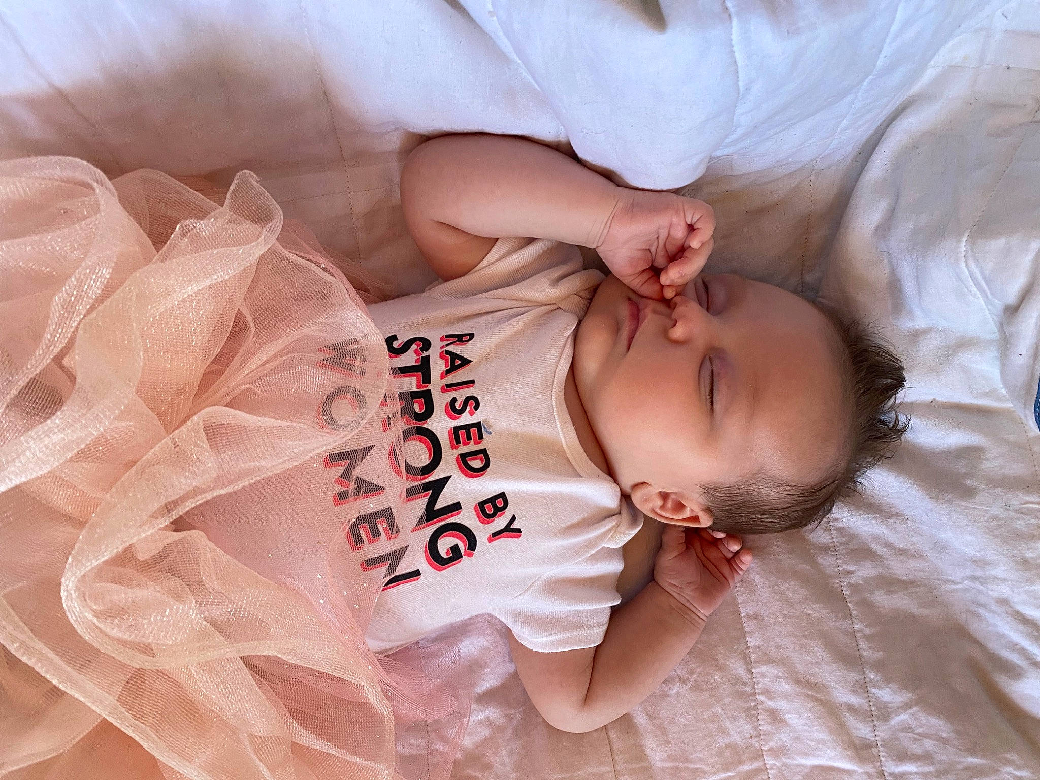 Alainah joined the competition — help win amazing prizes! arm, baby, baby_toddler_clothing, child, comfort, finger, hairstyle, happy, head, linens, mammal, nail, orange, person, pink, product, skin, sleeve, textile, toddler