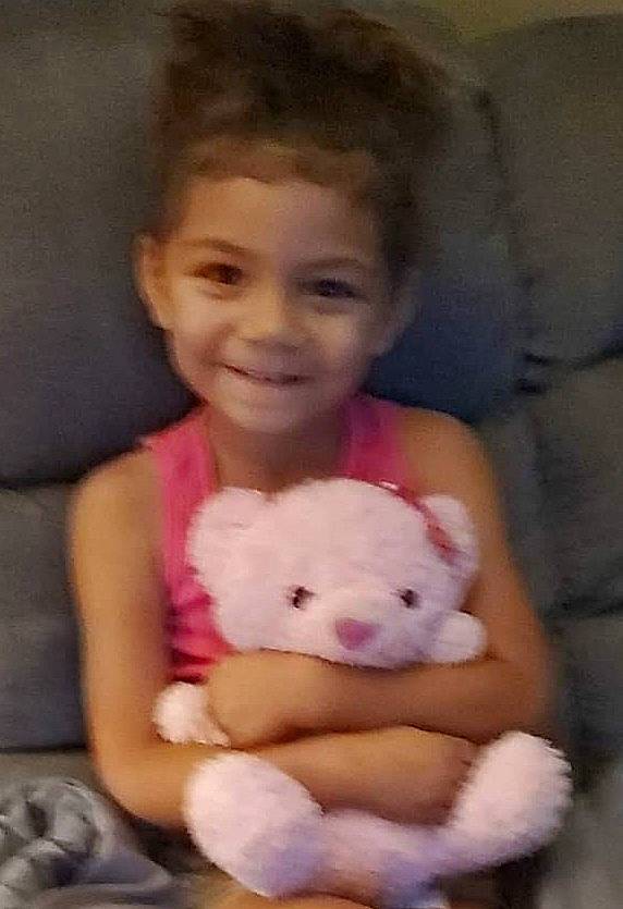 Kyera is registered to the contest to win money with this photo: baby_toddler_clothing, beauty, cheek, child, comfort, eye, face, fawn, fur, happy, head, joy, nose, person, pink, room, skin, smile, stuffed_toy, teddy_bear