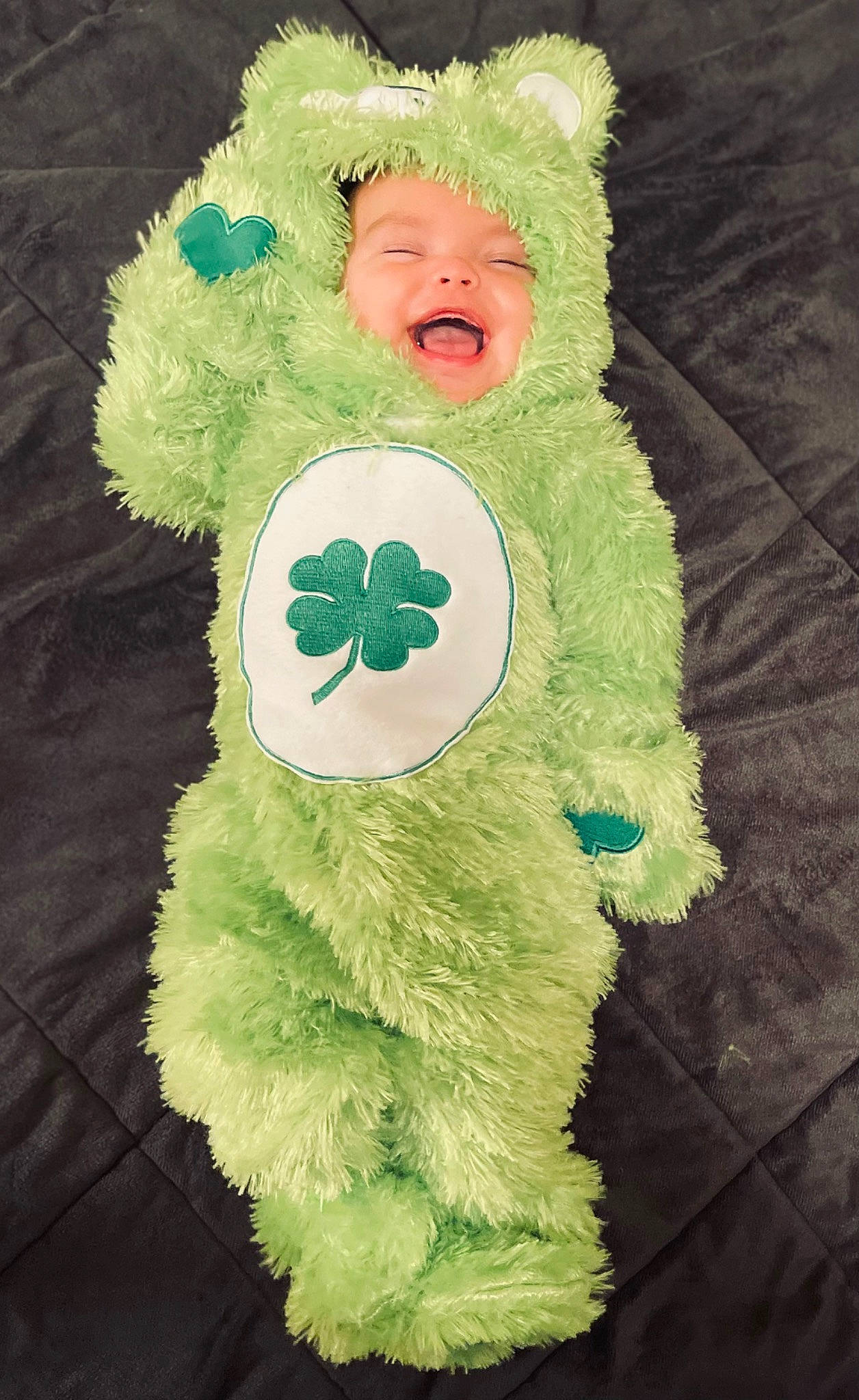 Adelina joined the competition — help win amazing prizes! costume_accessory, costume_hat, fictional_character, fur, fur_clothing, green, happy, head, headgear, holiday, leaf, natural_material, person, plush, stuffed_toy, textile, toddler, toy, tree
