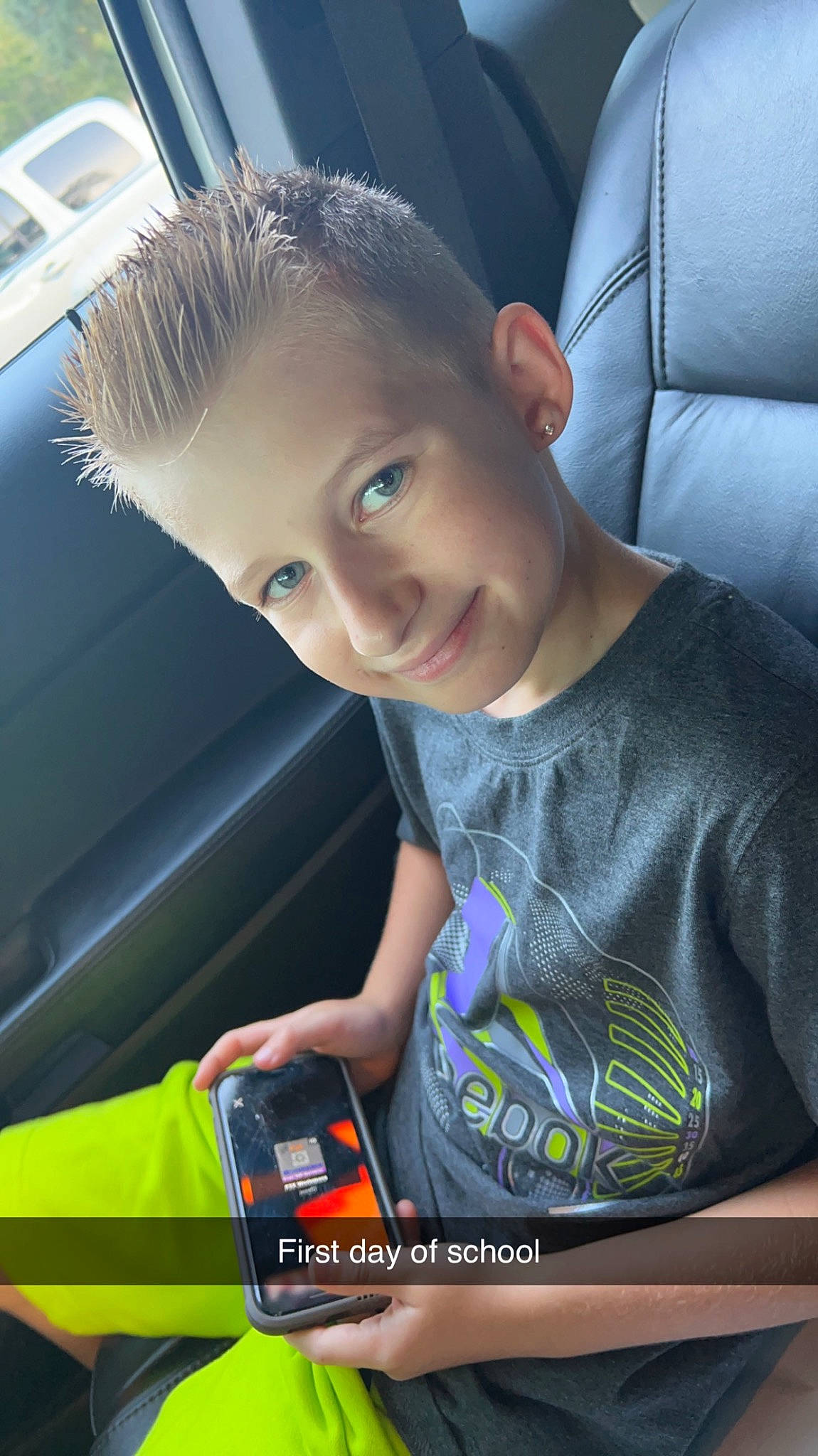 Riley joined the competition — help win amazing prizes! auto_part, automotive_design, automotive_exterior, blue, car_seat, child, electric_blue, family_car, fun, gadget, happy, joy, luxury_vehicle, motor_vehicle, person, smile, t_shirt, toddler, toy, travel