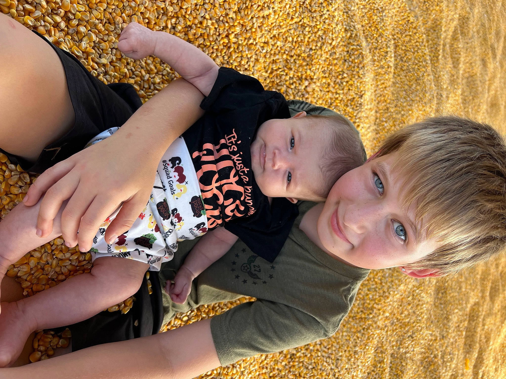 Zoey joined the competition — help win amazing prizes! beauty, brown_hair, child, fashion_accessory, fun, grass, happy, human_leg, jewellery, joy, nail, pattern, people_in_nature, person, sitting, skin, smile, thigh, toddler, wood