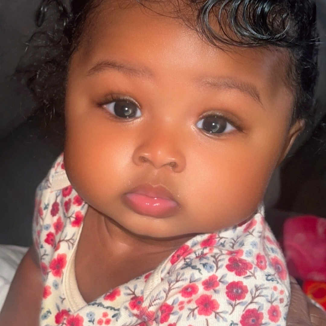 Aspen joined the competition — help win amazing prizes! adorable, baby, child, closeup, cute, cute_baby, expression, eyes, face, floral_outfit, hand, human, indoors, infant, innocent, lips, person, portrait, skin, young