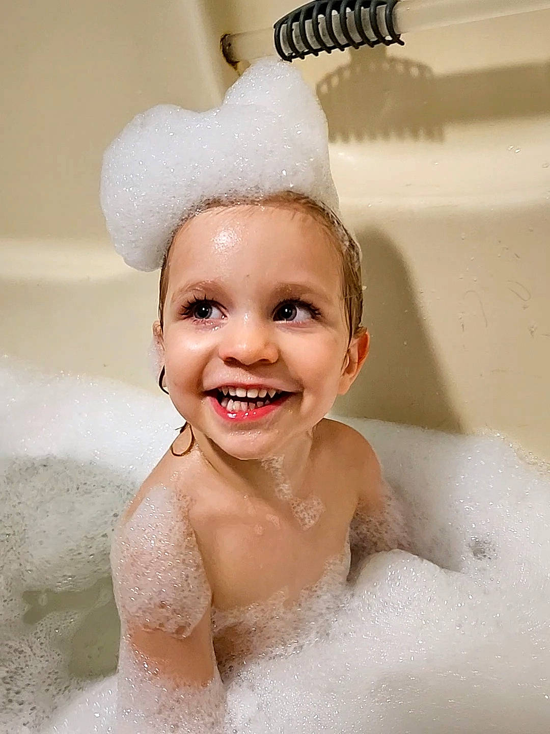 Misty joined the competition — help win amazing prizes! baby_bathing, bathing, bathroom, bathtub, eye, eyelash, face, fluid, foam, happy, headgear, jaw, joy, organ, person, photograph, plumbing, plumbing_fixture, skin, smile