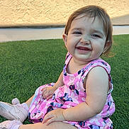 Hendrix joined the competition — help win amazing prizes! toddler, child, smiling, outdoor, grass, pink_dress, shoes, happy, baby, sitting, cute, portrait, sunlight, face, person, young_child, casual_clothing, daytime, playful, nature