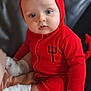 baby, blue_eyes, child, clothing, costume, cute, devil, face, fun, holiday, horns, indoors, infant, playful, portrait, red, sitting, sock, soft_toys, trident