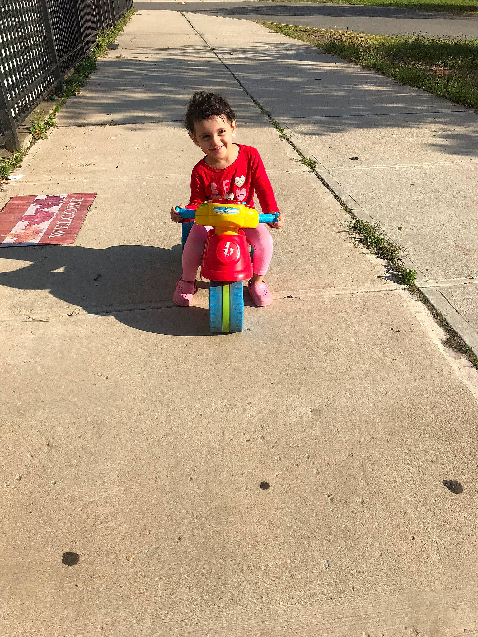 Melania joined the competition — help win amazing prizes! asphalt, child, fun, joy, leisure, person, play, playground, public_space, recreation, road, sidewalk, smile, toddler, vacation, vehicle