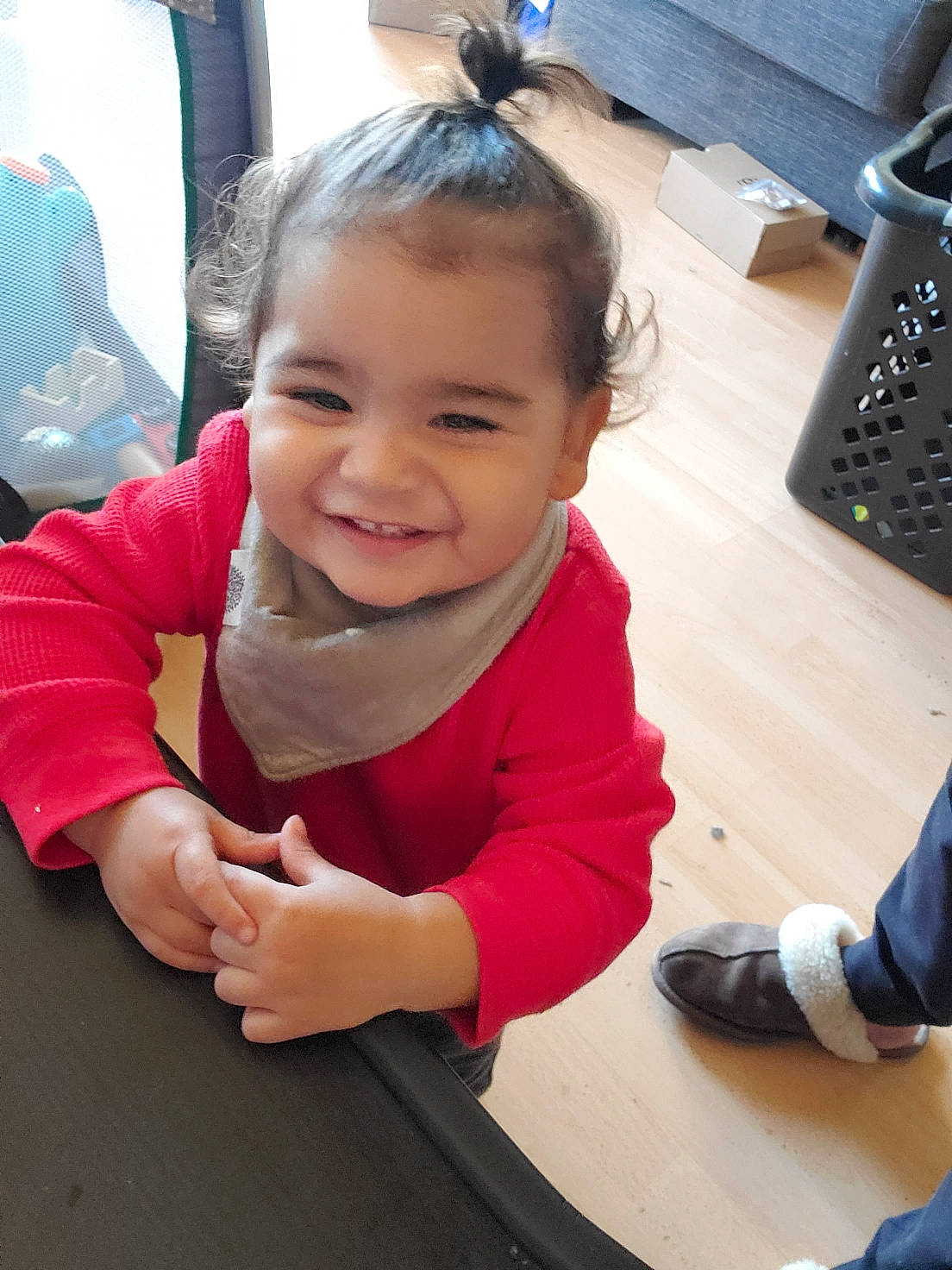 Joaquin is registered to the contest to win money with this photo: baby, child, electronic_device, finger, fun, hand, joy, leg, person, play, sitting, skin, smile, technology, toddler