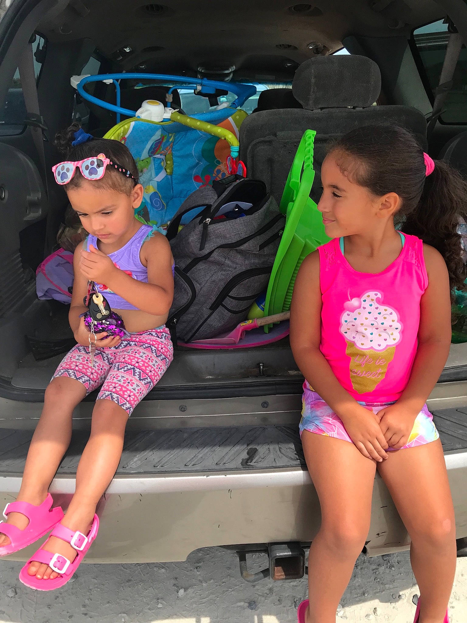 Katelyhn is registered to the contest to win money with this photo: child, fun, headwear, leg, person, pink, shorts, smile, style, summer, sunglasses, swimwear, vacation