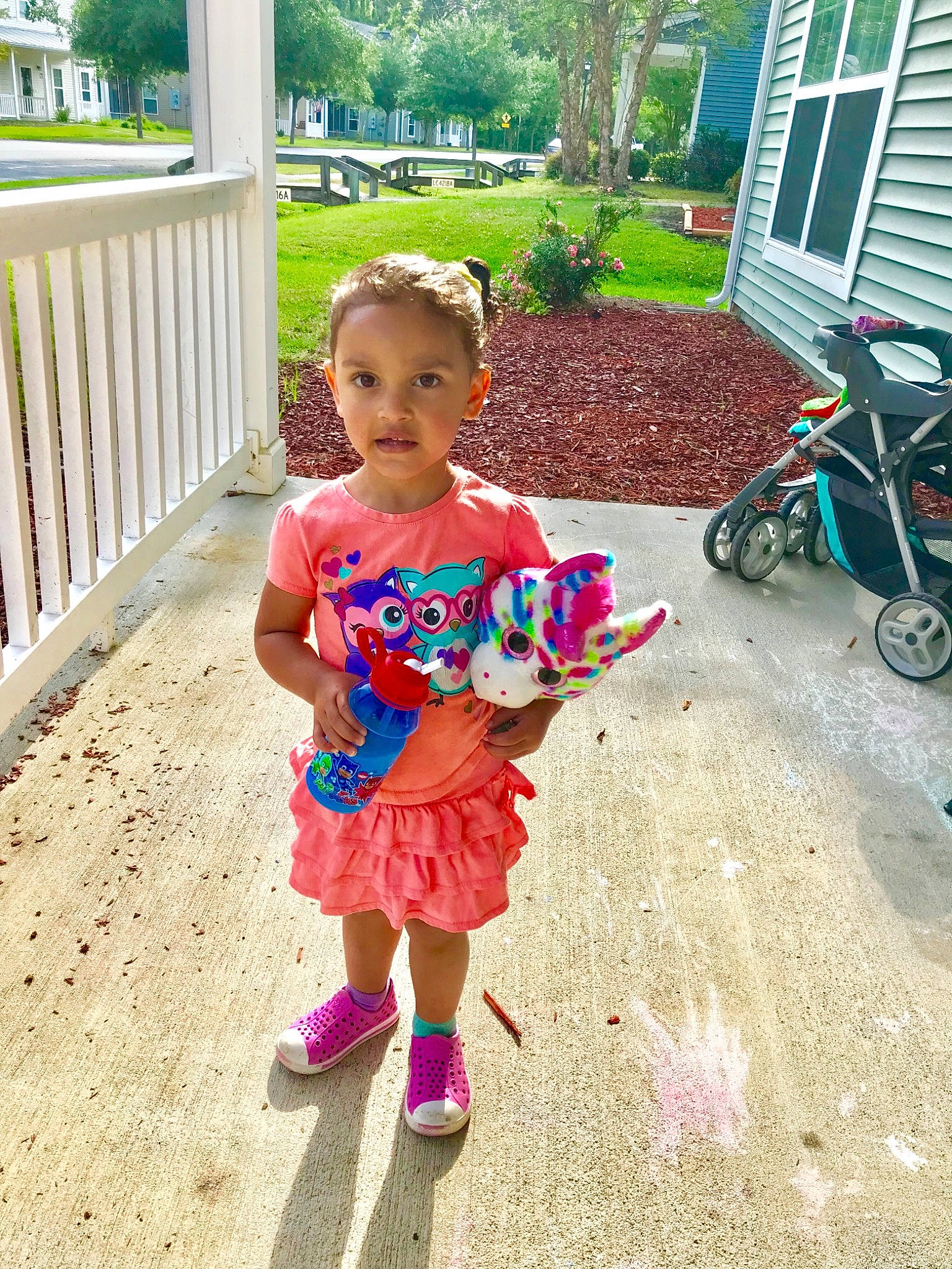 Ali is registered to the contest to win money with this photo: baby_toddler_clothing, child, dress, footwear, garden, happy, party, pattern, person, pink, plant, play, recreation, shoe, smile, summer, toddler, vacation, yard