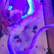 Amira joined the competition — help win amazing prizes! newborn, baby, infant, hospital, phototherapy, blue_light, diaper, eyemask, towel, umbilical_cord, bassinet, sleeping, medical, healthcare, patient, neonatal, cute, child, bed, resting