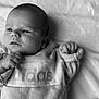 Eliot a rejoint le concours — aidez-le/la à gagner de superbes lots ! adidas, baby, black_and_white, blanket, close_up, clothing, cute, expression, face, hands, indoor, infant, newborn, portrait, resting, sleepwear, small_hands, soft_texture, sweatshirt, young_child