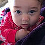 baby, blanket, bodypart, clothing, couch, dress, face, finger, furniture, hand, happy, head, homedecor, indoors, pajamas, person, photography, portrait, quilt, smile