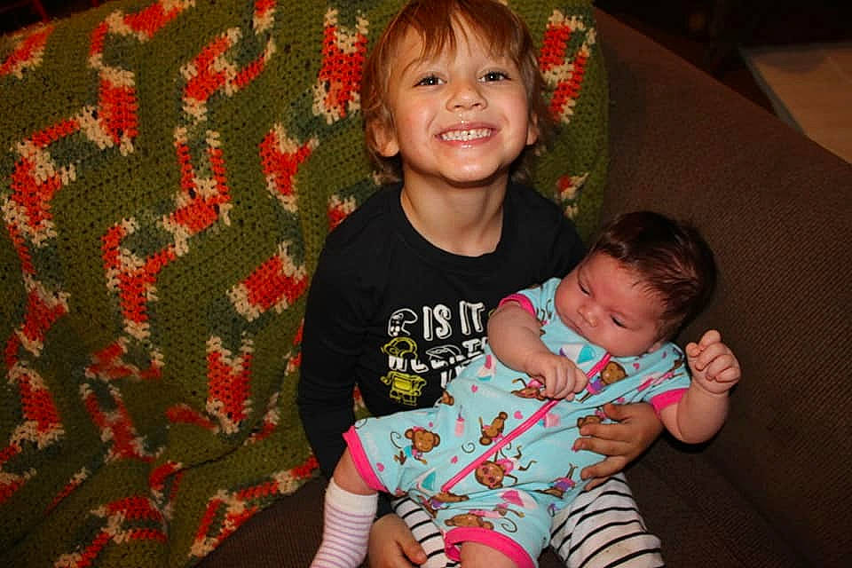 Maddilynn joined the competition — help win amazing prizes! baby, child, christmas, christmas_eve, cousin, family, fun, holiday, iris, joy, people, person, sibling, sitting, skin, smile, toddler, vacation